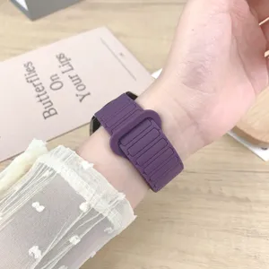Silicone magnetic smartwatch replacement band in deep purple, textured loop design for daily wear.