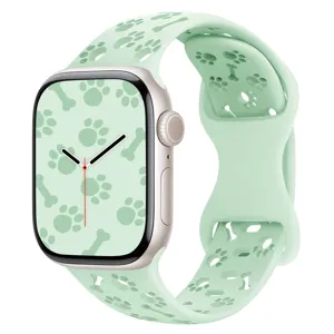 Light mint green silicone watch band with hollow paw and bone pattern for smartwatches.