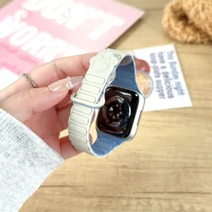 Silicone magnetic watch strap detail, cute paw print design, compatible with apple watch.
