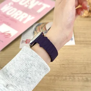Purple silicone magnetic watch strap with cute paw print design for smart watch daily wear.