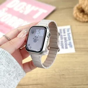 Silicone magnetic watch band replacement compatible with Apple Watch, soft strap for daily wear.