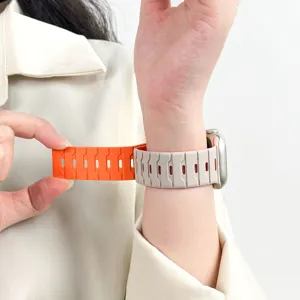 Cinturino per orologio in silicone bicolore con design magnetico per smartwatch.