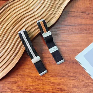 Replacement nylon woven watch band with folding magnetic buckle, striped design, durable strap.