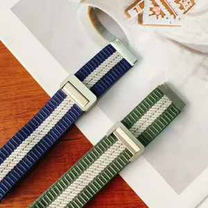 Striped nylon braided watch strap with metal buckle and magnetic closure, detailed design.