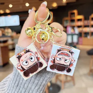 Cute cartoon Nezha Rubik's Cube keychain, creative pendant for bags, student gift and toy.