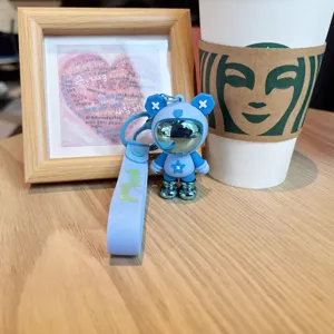 Llavero de oso astronauta azul, lindo colgante de bolso de PVC para regalos de moda.