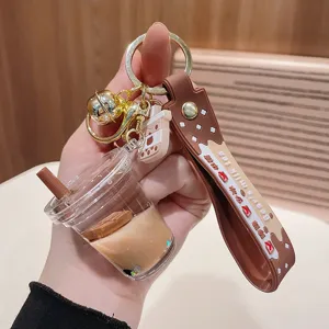 Süßer Bubble Tea Schlüsselanhänger mit flüssigem Acryl Anhänger und schönem braunem Band.