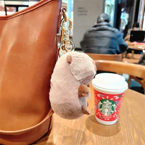 Cute capybara plush keychain bag charm soft stuffed animal toy pendant for daily use accessory.