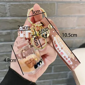 Kreativer Treibsand Schokolade Schlüsselanhänger Acryl Flasche süße Schultasche Anhänger