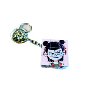 Cute Chinese cartoon Nezha Rubik's cube keychain, fun decompression bag pendant for students.