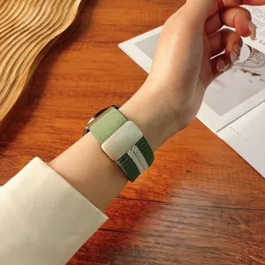 Green striped nylon braided watch strap with magnetic folding buckle for smartwatches.