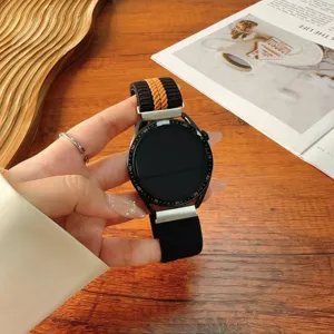 Detailed view of the striped nylon braided watch strap in black and orange, 22mm size.