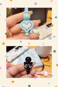 Cute beaded phone charm with pixel heart and black cat pendants for bags and keys.