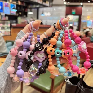 Colorful beaded cat phone charm and bag keychain, cute cartoon animal pendant for women.