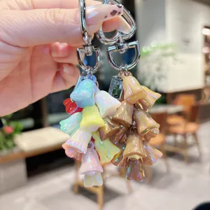 Colorful lily of the valley flower keychain aesthetic bag charm accessory detail shot