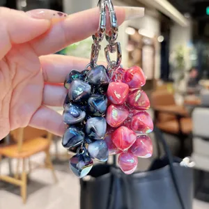 Detailed close-up view of the gradient crystal strawberry keychain, showcasing glossy beads.