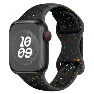 Bracelet de montre en silicone avec motif d'éclaboussures colorées et trous de ventilation.