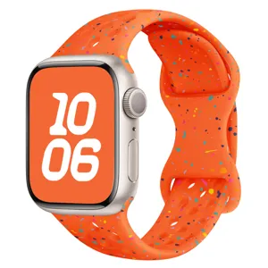 Bracelet de rechange en silicone moucheté coloré avec trous respirants pour Apple Watch.