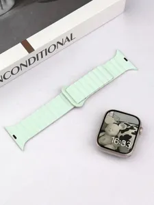 Silicone mint watch band replacement for Apple Watch, soft breathable strap accessory.