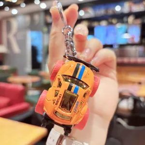 Mini alloy off-road racing car model keychain, trendy cartoon bag pendant display.