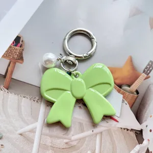 Green bow keychain acrylic pearl charm cute aesthetic accessory for bag and phone