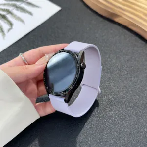 Smartwatch silicone strap detail view with elegant purple band and black dial.