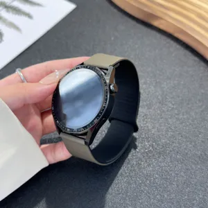 Detailed view of the soft silicone watch strap with classic round dial and dark bezel design.