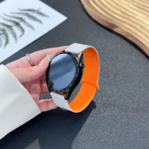 Silicone watch strap replacement, dual color white and orange design, durable and stylish.