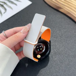 Silicone magnetic watch strap compatible with smartwatches, featuring dual-color design.