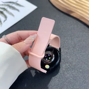 Detailed view of pink magnetic silicone watch strap, showing texture and buckle design clearly.