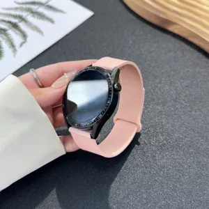 Replacement pink silicone watch strap compatible with smartwatches, soft and comfortable.