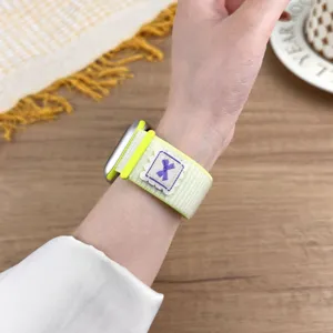 Nylon loop watch strap compatible with apple watch, soft velcro design with cute bow embroidery.