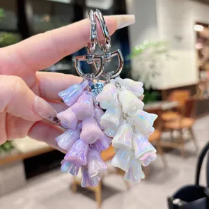 Iridescent lily of the valley keychain pendant, stylish bag charm accessory for daily use.