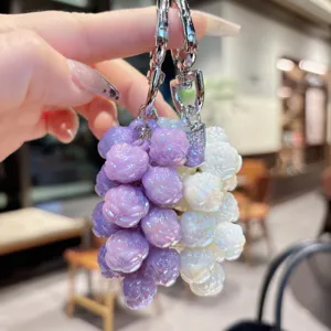 Detailed view of colorful rose grape cluster keychain with shiny beads and metal clasp.