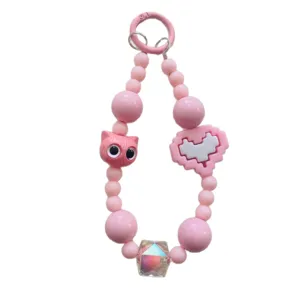 Pink cat bead phone charm, cute pixel heart keychain, kawaii mobile strap accessory.