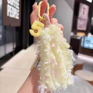 Portachiavi con frange in lana soffice fatto a mano con ciondolo numero giallo per borsa carina