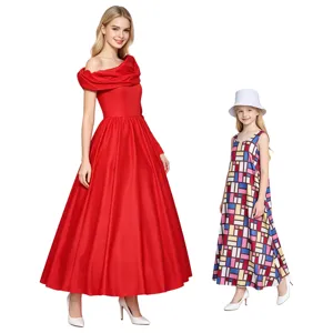Elegant red off-shoulder evening dress and matching colorful geometric kids dress main view
