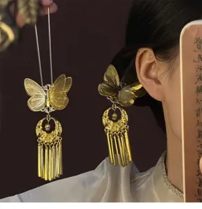 Chinese style golden butterfly hairpin with elegant tassels, perfect hair accessory for women.