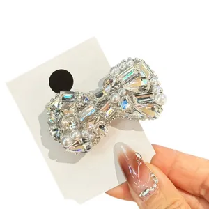 Sparkly rhinestone bow hair clip for women, elegant crystal pearl hairpin duckbill clip.
