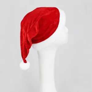 Classic red velvet Christmas hat with white plush trim and pom pom for holiday party wear.