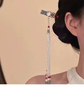 Chinese style hair stick detail pearl tassel traditional hairpin close up elegant hair accessory