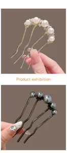 Elegant U-shaped hair fork with pearls and rhinestones, perfect for chic bun hairstyles.