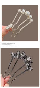 Exquisite U-shaped hair fork with pearls and crystals, perfect for elegant bun hairstyles.