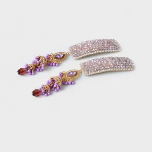 Elegante Chinese haarspelden met paarse kristallen en franjes. Mooi haaraccessoire voor aan de zijkant.
