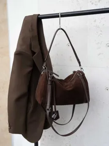 Dark brown suede shoulder bag, stylish casual commuter handbag with spacious capacity and strap.