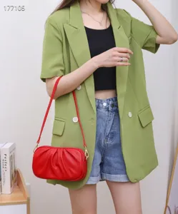 Red leather shoulder bag for women, soft pleated crossbody bag with zipper and chic design.