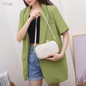 Genuine leather women's shoulder bag, stylish pleated crossbody bag with metal details.