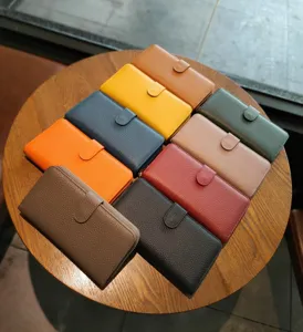 Multi-color genuine leather long wallet for women, elegant snap-closure multi-functional purse.