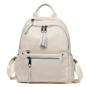 Genuine leather women backpack detail featuring multi zip compartments and comfy straps.