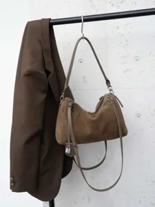 Brown suede shoulder bag detail, large capacity casual commuting handbag with stylish padlock charm.